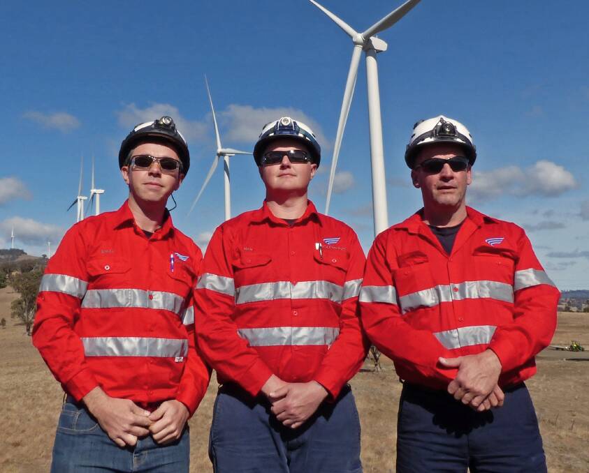 OVERSEAS EXPERIENCE: Simon White, Chris Sippel and Nick Wall have all been sent to China to train at a wind turbine generator technology. 