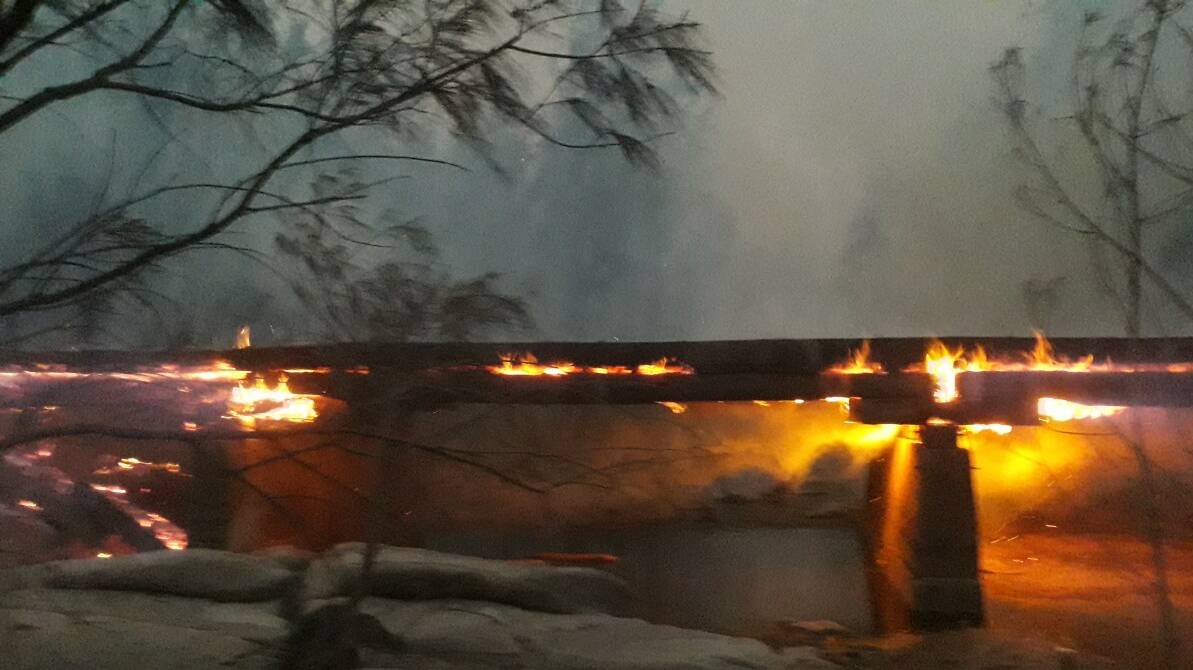The bridge burns at Wytaliba.