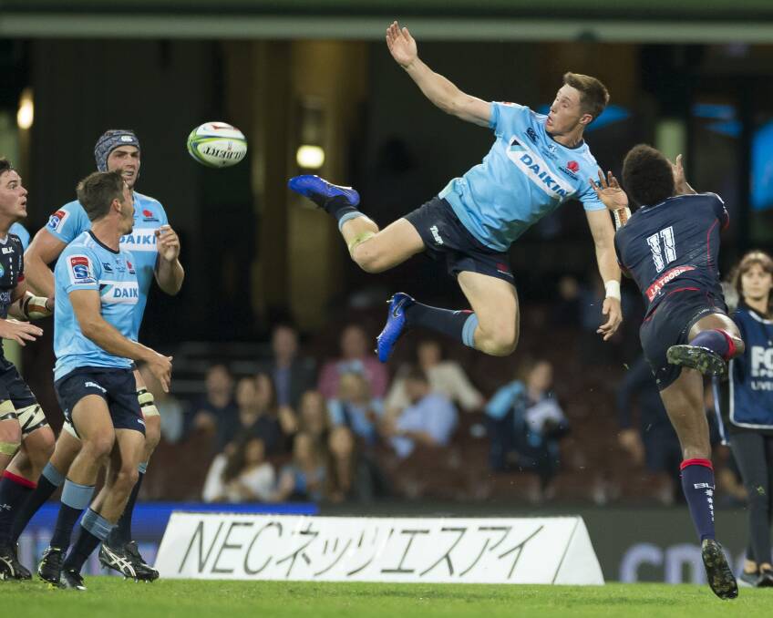 FLYING HIGH: Glen Innes export Alex Newsome has signed a new deal with the Waratahs. Photo: Craig Golding
