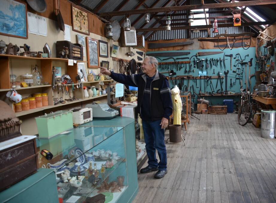 HISTORY PRESERVED: Emmaville Gem Museum's Ron Jillett describes the old items that used to be available in Foley's General Store. Photo: Rachel Baxter.