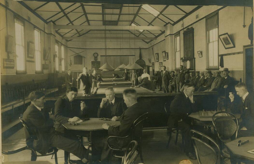 Popular spot: The three billiard tables shows this photo was taken in the Glen Innes School of Arts building some time after 1920.