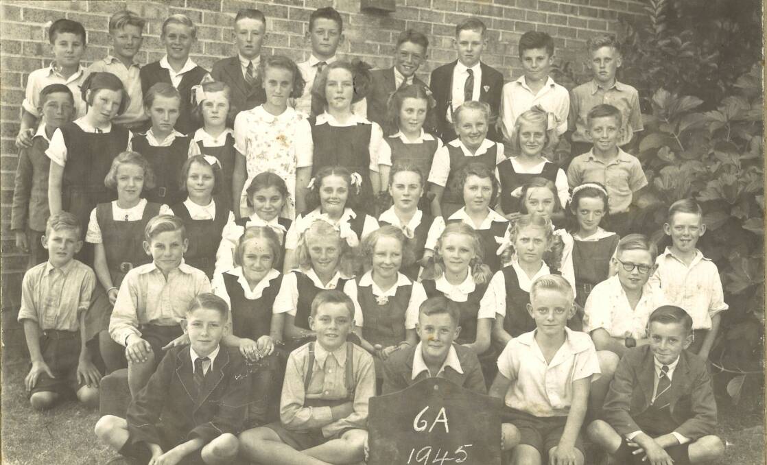 Faces from the 1940s: A smiling bunch of Glen Innes Primary School students in 1945.