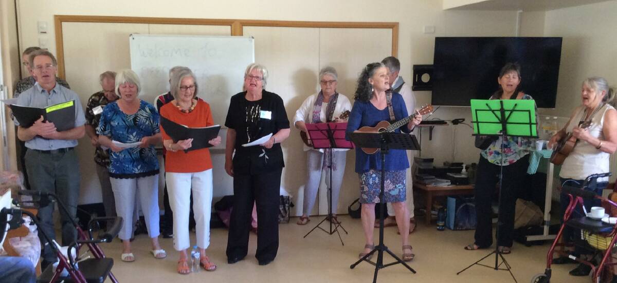 Christine Davis (ukulele in hand) leads the Cool Choir and ukulele group in a performance at Haddington Nursing Home. Next stop is the Deepwater School of Arts Hall stage for a free concert on Saturday night.