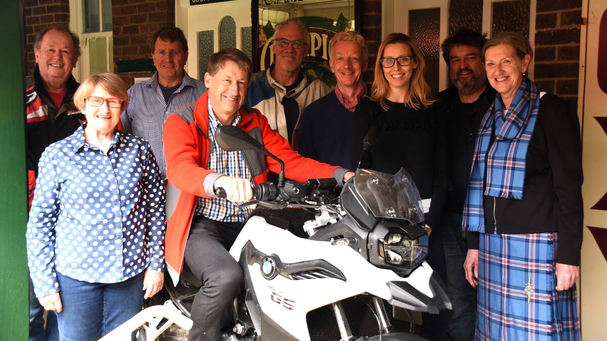Councillor Steve Toms got a chance to sit aboard one of the top-of-the-range BMW motorcycles when the bikers spun by History House on their Highlands tour.