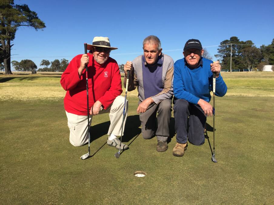 ACING IT: Greg Law, Bob Gallagher and John Conyard have hit hole-in-ones on the golf course this year. Their efforts and accuracy earned them a $100 bonus from Glen Innes McDonald's. 