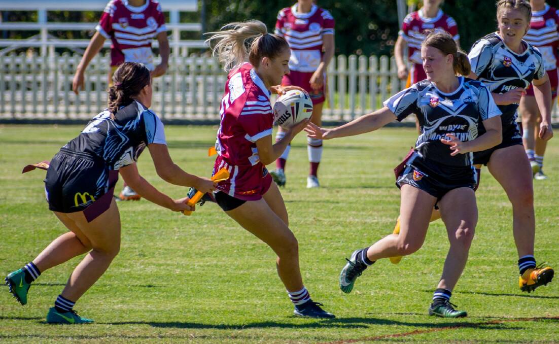 DEFENCE: Molly Campbell and Emilie Hodge halt the Inverell attack. Photo: Brenton Hodge. 