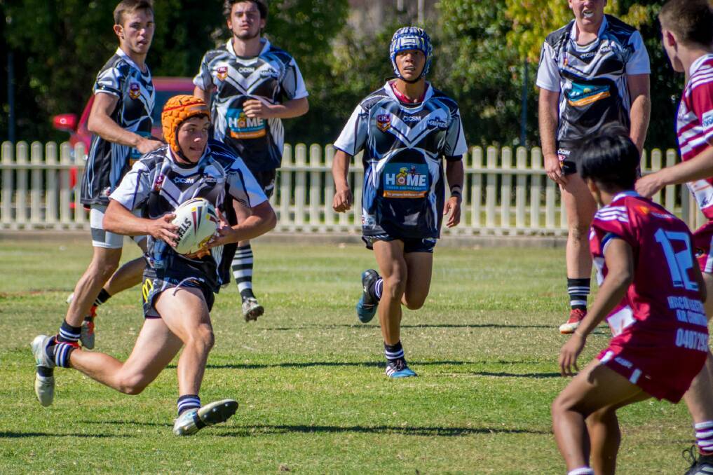 ON THE FRONT FOOT: Liam Peterson runs into the Inverell defence in the under 18's clash on Saturday. Photo: Brenton Hodge. 