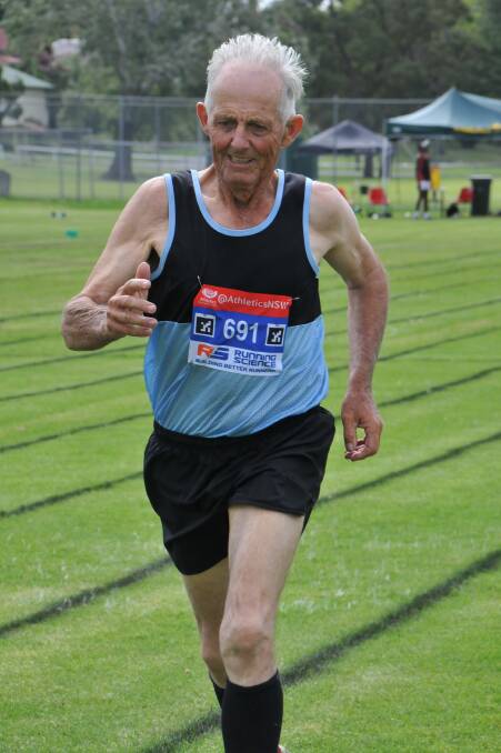 GOING THE DISTANCE: Champion runner Neville McIntyre received a medal in the pointscore for the veterans age group. 