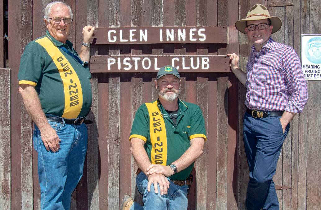Glen Innes pistol club treasurer Wayne Unicomb and president Jason Tom with Northern Tablelands MP Adam Marshall at the club over the weekend.