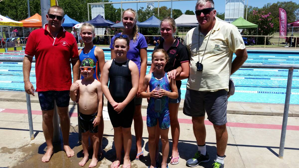 SIZZLING: Glen Innes Redfins in Tamworth. Back row: Charlie and Cadence McShane, Kyara McIntyre, Sophie McCormick with coach Keith Watts. Front: Warne McShane, Beth and Mary Arandale.