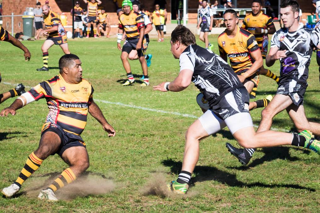 INTO ACTION: Perry Stapleton takes on the Boomerangs' defence in the round one fixture at Mead Park on Sunday. Photo: Brenton Hodge. 