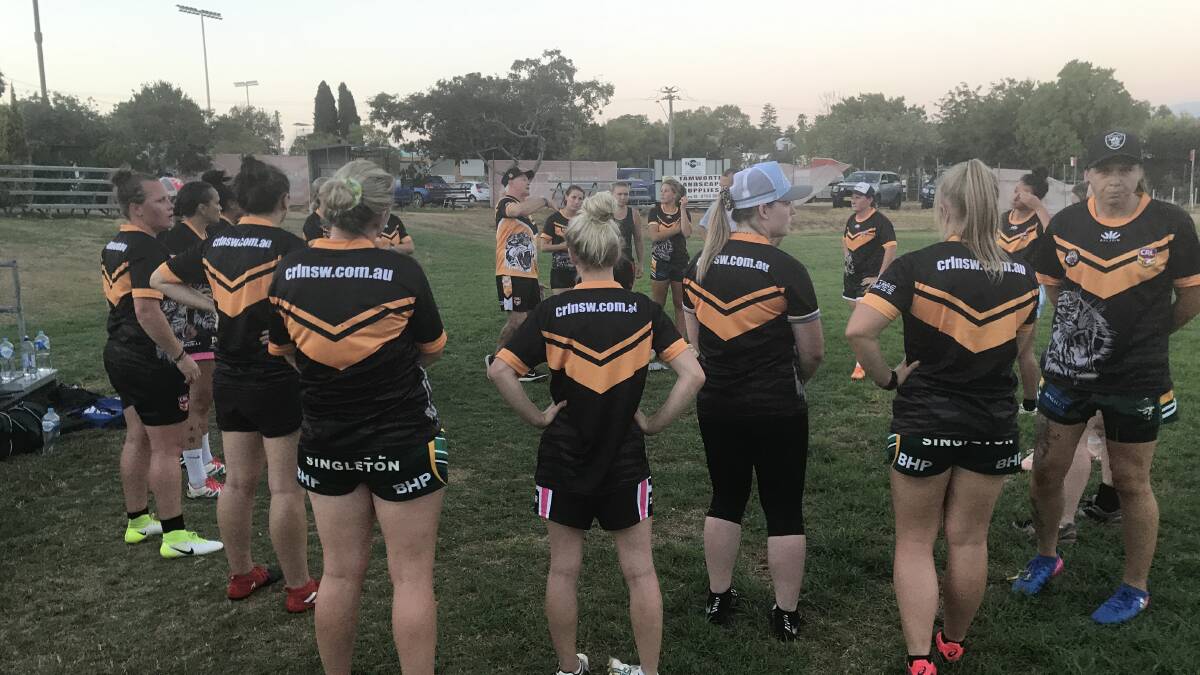 Greater Northern Tigers Ladies coach Mick Schmiedel addresses his side during Monday's training session at Ken Chillingworth Oval.