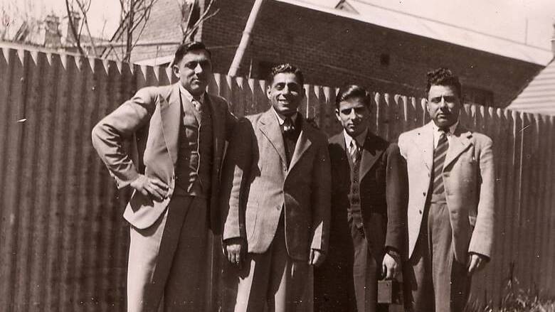 Con, Jack, Charles and Stratis Tzanne pictured in Armidale in 1945. Con and Charles ran the Nectar Cafe in Armidale where Paul worked and saved for his own cafe.