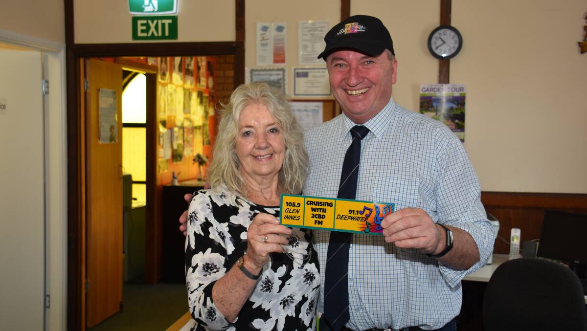 Barnaby Joyce shows off a new sticker from Glen Innes community radio. 