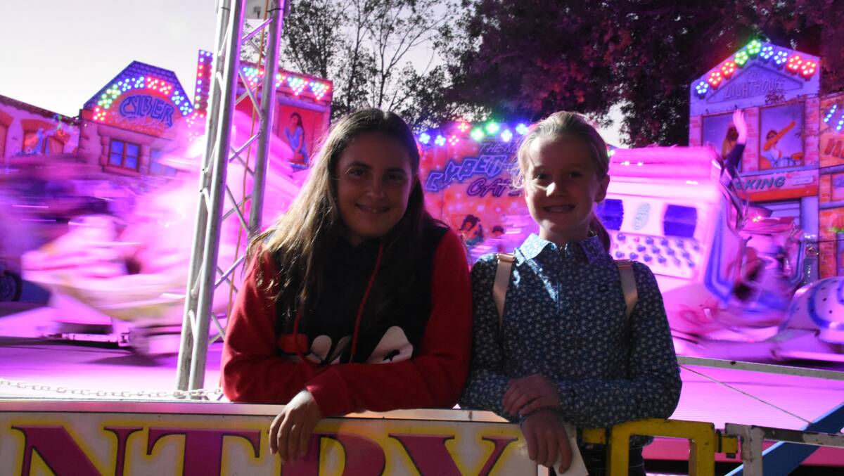 COLOUR WHEEL: Emily McAlister and Charli Lyne at the 2019 Glen Innes show. Picture: Andrew Messenger.