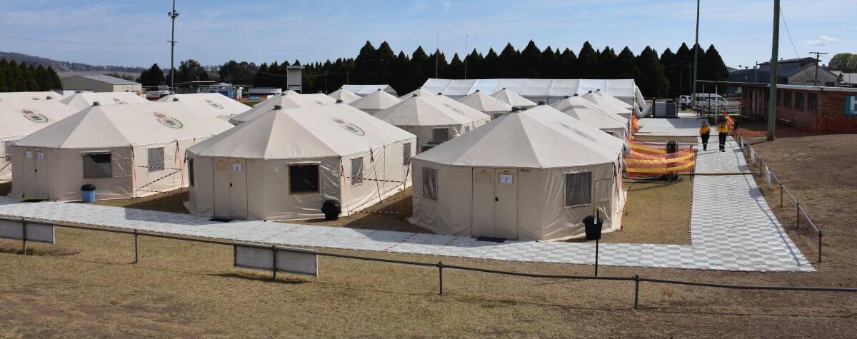 PLACE OF REST: Glen Innes' Mead Park has been converted into a tent city housing 200 RFS volunteers. Pictures: Andrew Messenger.
