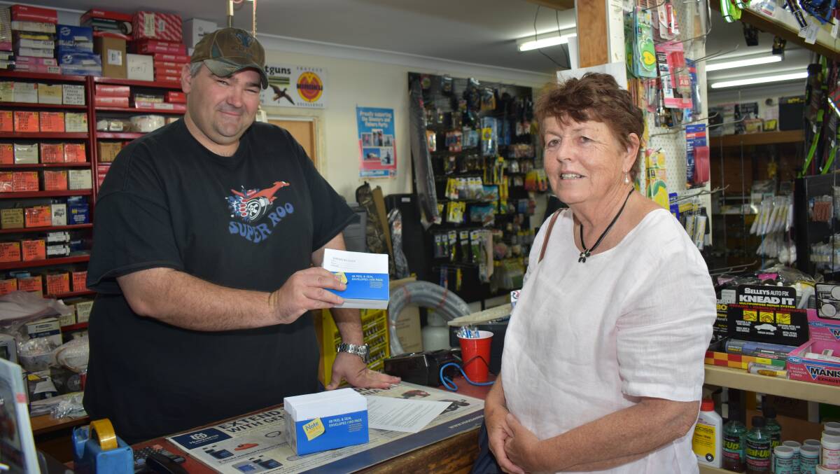 BUY LOCAL: Nic Ward at Grey Street Spare Parts is a participating business. With Moira Munro. Picture: Andrew Messenger. 
