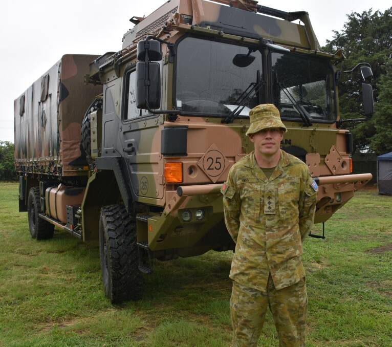 Captain Daniel Teys is one of over a hundred soldiers sent to Glen Innes to help with reconstruction after last year's bushfires. 