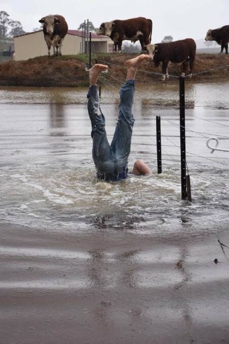 Dundee farmer Grant Kneipp was overcome with joy to see his dam full again, and couldn't resist a swim.