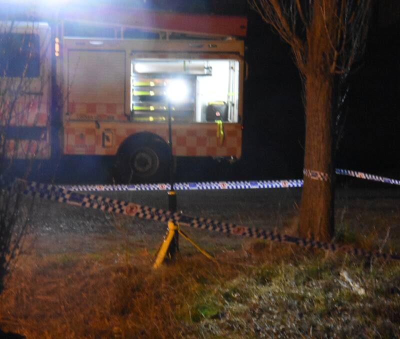 A dead body was found in a Glen Innes creek earlier today. SES workers and forensic police were on scene. Pictures: Andrew Messenger.