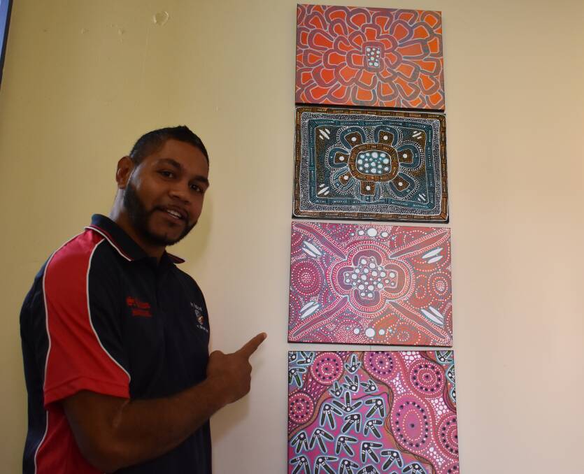 Nicholas Levy painted this work. He's now helping to organise the community centre's first art competition. 