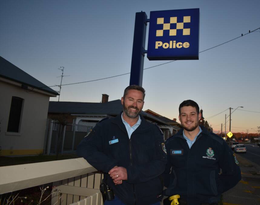 Glen Innes cop Brad Wood with Brendan Vielhaur before the probationary constable's first patrol. 