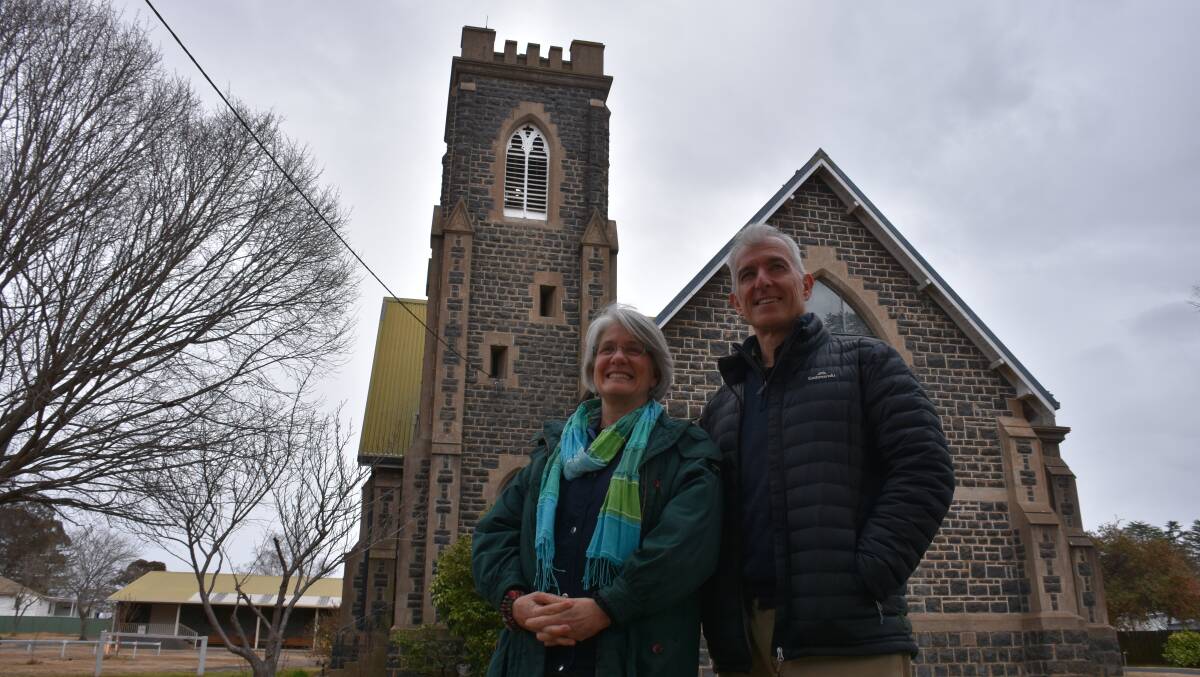 Reverend Andrew Newman (right) and Margie Newman at the Glen Innes Anglican church. They're moving to Uganda. 