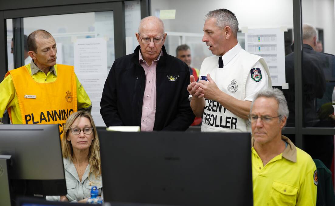 REGAL VISIT: Governor General David Hurley inspects the hard-working RFS crews directing the fight with the region's many fires. 