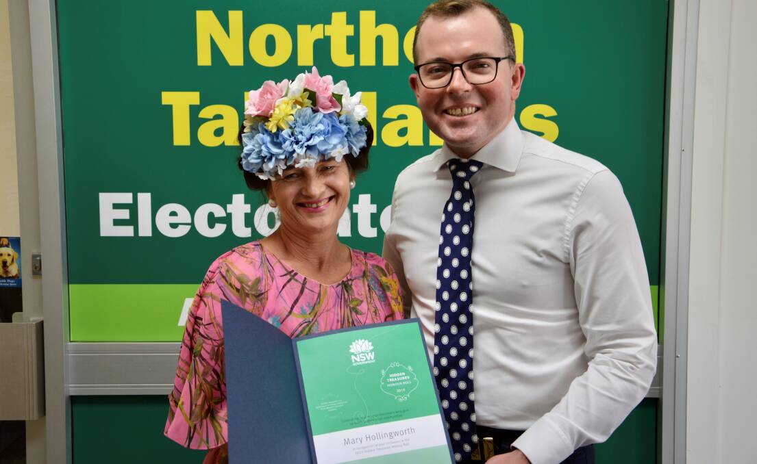Mary Hollingworth receives her 2019 Hidden Treasure certificate from MP Adam Marshall. 