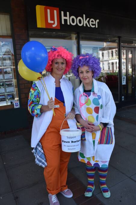LIGHTER SIDE: Mandie Ramma and Nerolie Winter show the lighter side of banking in Grey street on Friday, raising money for a children's charity.