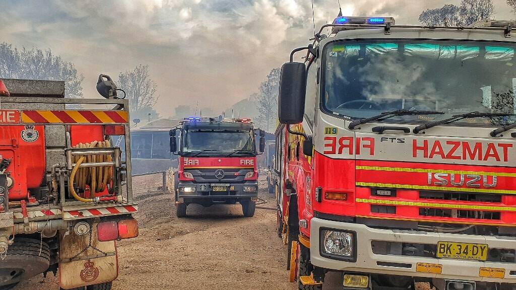 Fire crews protect homes near Tenterfield. Picture: Glen Innes fire and rescue station 302