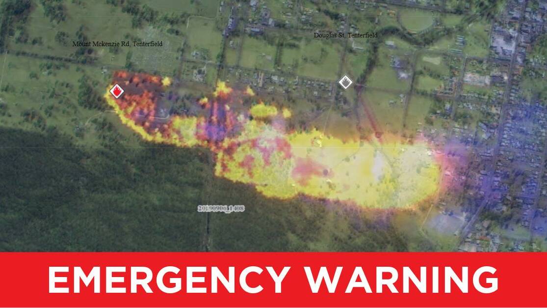 RFS have issued an emergency warning for a blaze burning out of control, which threatens homes on the outskirts of Tenterfield. Picture: RFS Twitter.