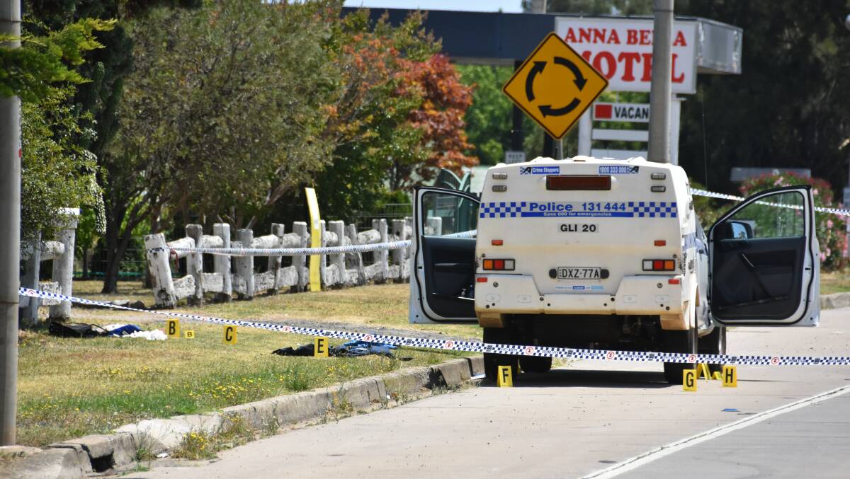 Crime scene: The police paddywagon driven by the injured police cordoned off by police. Photo: Andrew Messenger