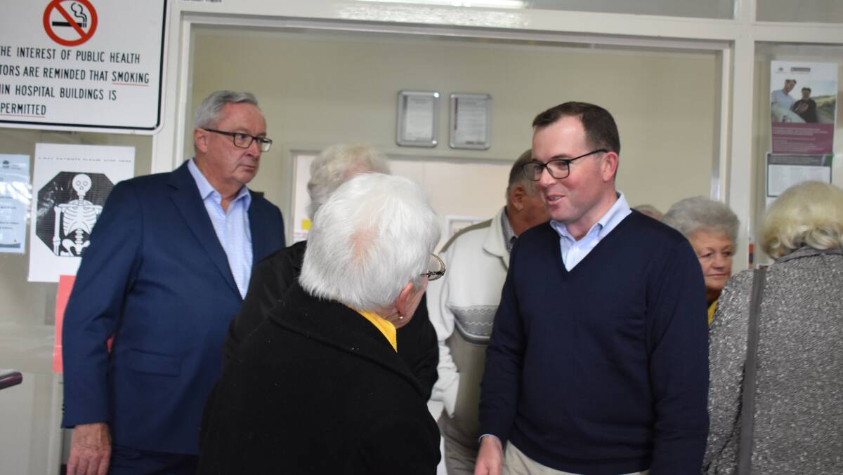 Adam Marshall and Brad Hazzard (left) visit the hospital recently. Jan Sharman (foreground) was one of the strongest voices in favour of the project. 