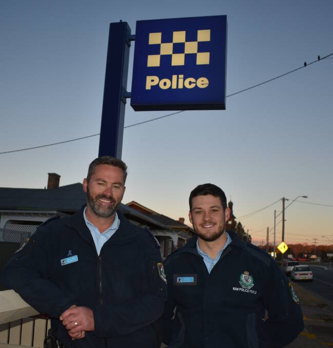 Glen Innes cop Brad Wood with Brendan Vielhaur before the probationary constable's first patrol. 