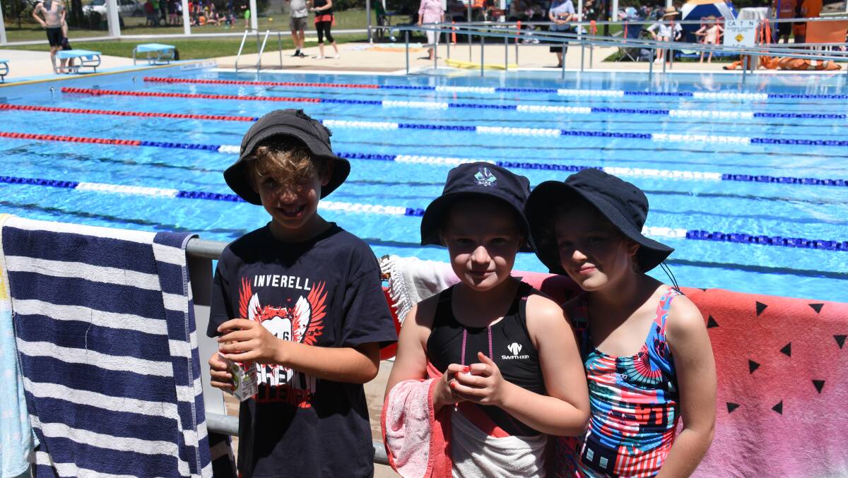 Dylan Chaffey, Taliah Husband, Maggie Duddy at the Glen Innes Public School swimming carnival. 