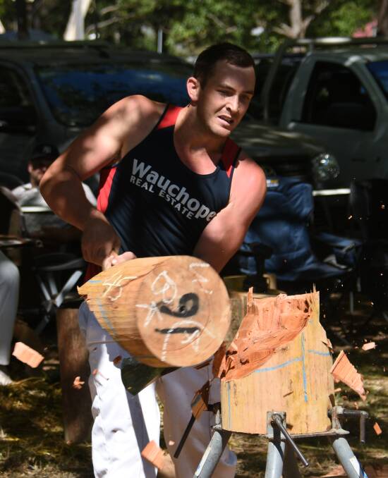 CRACK: Beau Kettle from Wachope wins the standing block woodchopping event.