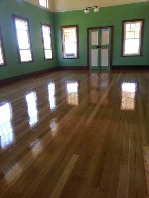 A nicely polished floor; much improved from the wreck of a building in 2009.