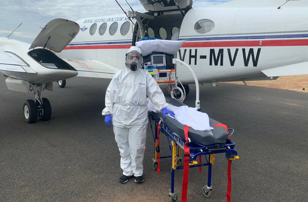 Dubbo-based RFDS nurse Lydia Newton in full PPE gear. The RFDS in NSW has done eight full PPE COVID alert transfers (none positive).