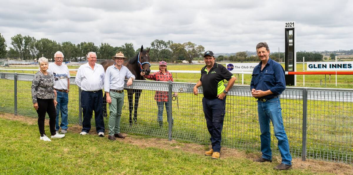  Dishing up more support to the Glen Innes Jockey Club, this time for a kitchen upgrade at the racecourse, Glen Innes Jockey Club committee members Lynne Ferguson, left, Warwick Ferguson, Secretary Barry Luxford, Northern Tablelands MP Adam Marshall, Trainer Kathy Cunningham with racehorse Talent Award, Vice-President Peter Ritter and President Mark Ritchie. 