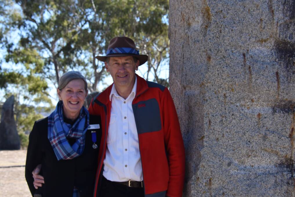 BY THE STONES: Mayor Cr Steve Toms, and his wife Judi, Australian Standing Stones Management Board chair. Photo: Nicholas Fuller