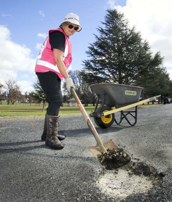 Carol Sparks fixed potholes in the road as part of her council election campaign in 2016.