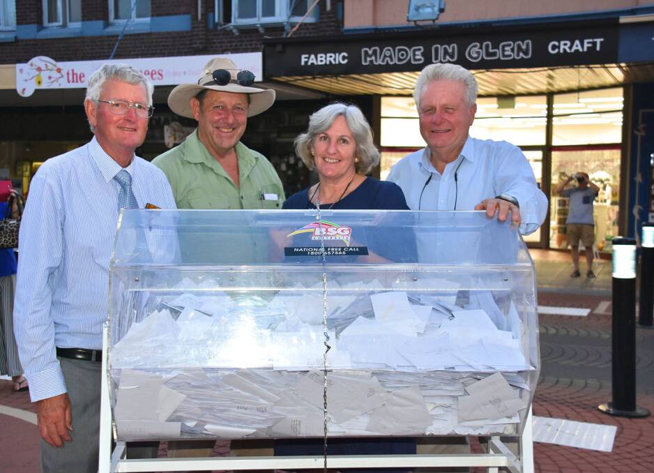 DRAWING THE PRIZES: Bill Munro (Spend in Glen committee), Landmarks' Jim Ritchie, Maryn Burgess (Spend in Glen Committee), and BIG chairman Peter Teschner. Picture: Nicholas Fuller