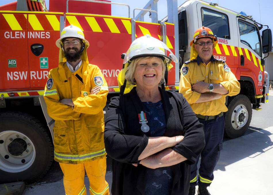 FIREY SPARKS: Glen Innes Rural Fire Service needs volunteers for radio  communications.  Mayor Carol Sparks, proudly wearing her 20 year service medal, is learning the process.