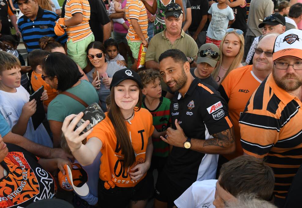 MARSHALLING FANS: Hundreds lined up for selfies with fan-favourite Benji Marshall. Photo:  Gareth Gardner 200418GGE021