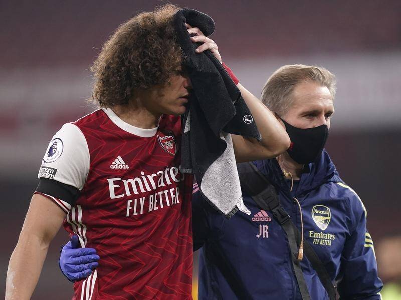 Arsenal player David Luiz played on after a clash with Wolverhampton Wanderers' Raul Jimenez.