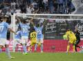 10-man Lazio scored a 2-1 home win against Bologna to begin their Serie A season. (AP PHOTO)