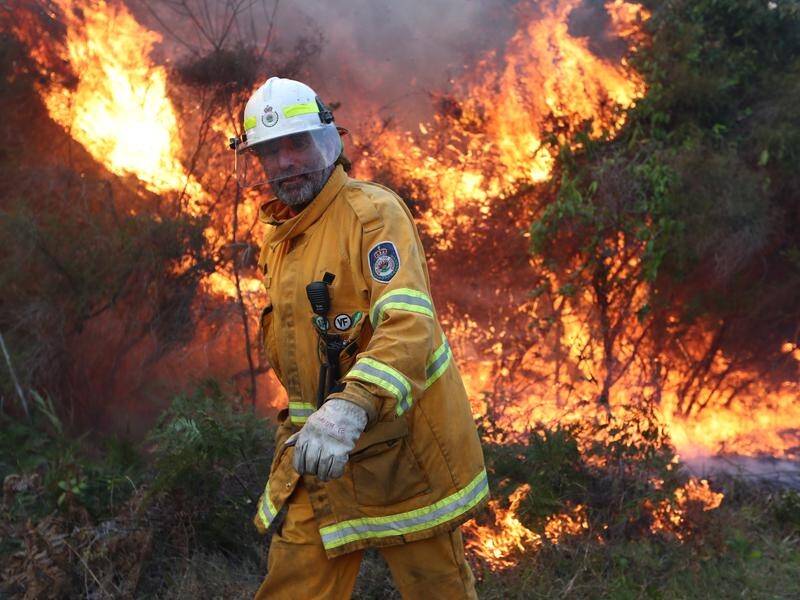 Two bushfires continue to burn out of control in NSW but improved conditions are forecast across NSW