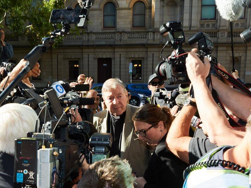 A dozen media firms admitted breaching an order banning publication of Cardinal Pell's conviction.