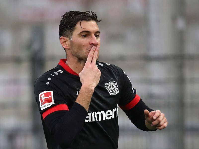 Two-goal Lucas Alario celebrates his equaliser in Bayer Leverkusen's 4-2 win at Freiburg.